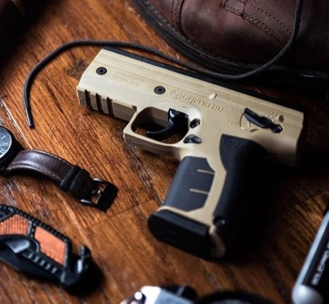 Pistolet na kule gumowe i pieprzowe BYRNA HD TAN kal.68 CO2 8g zestaw (WYPRZEDAŻ) Pistolet na kule gumowe i pieprzowe BYRNA HD TAN kal.68 CO2 8g zestaw (WYPRZEDAŻ)